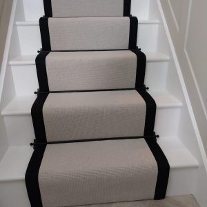 Grey Berber stair runner with stitched Black taped edge