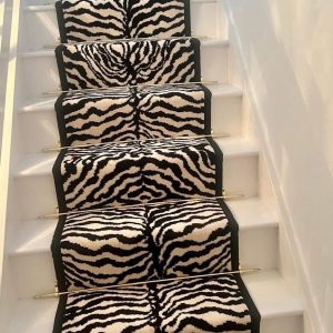 Zebra Wilton stair runner with Black taped edge 7m