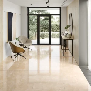 Falquon cream marble effect high gloss AC5 laminate flooring in a bright hallway